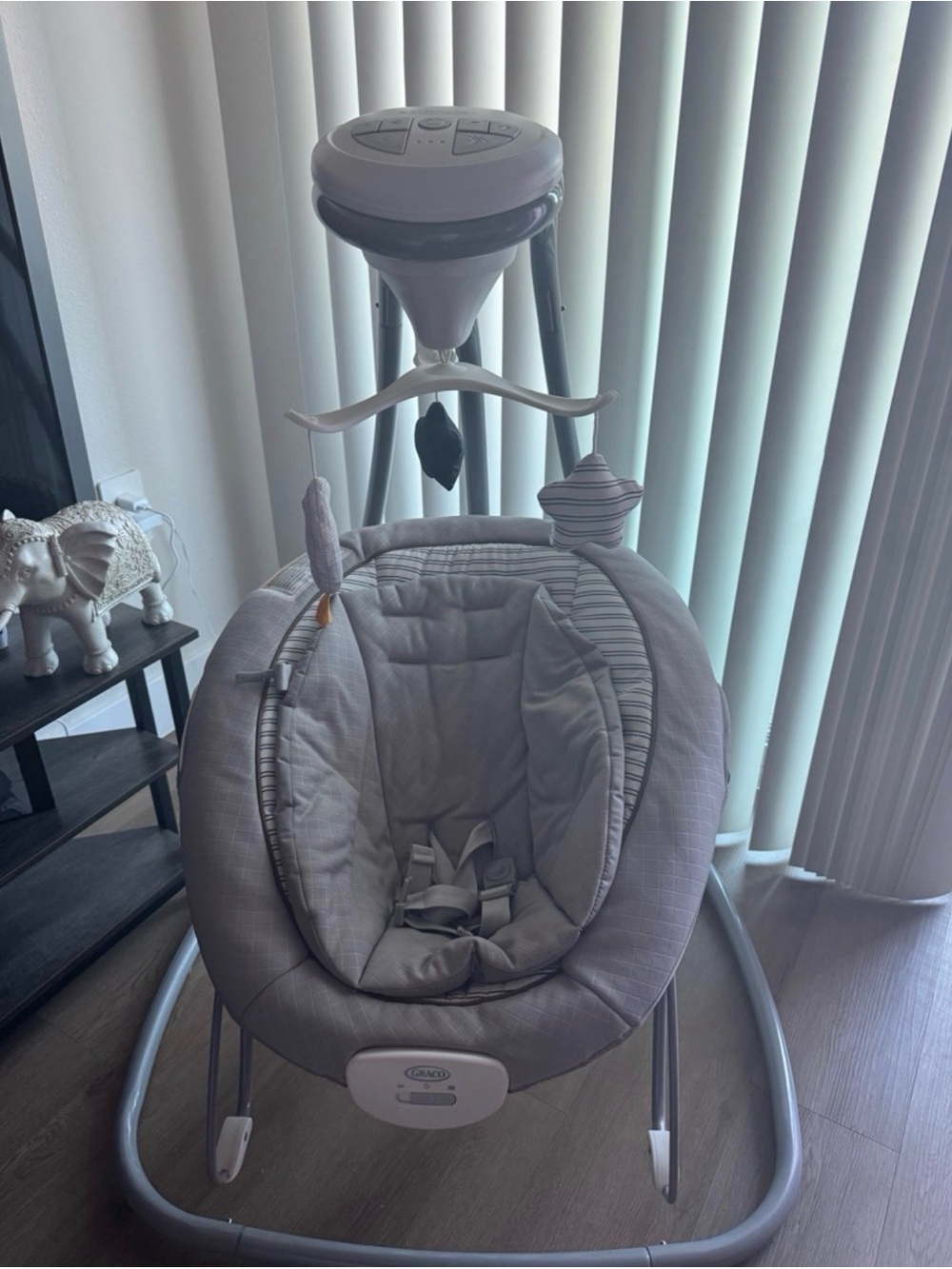 Neutral Gray Infant Swing with Plush Mobile